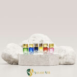 شیشه عطر ناسوماتو ۱۵ میل رنگی مدل PT904C برروی سنگ