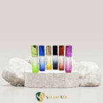 شیشه عطر آلفا رنگی ۱۵ میل کد DH3121 بروی سنگ