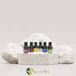 شیشه عطر سانتال رنگی ۳۰ میل کد AZY-16-8 برروی سنگ