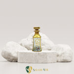 شیشه عطر RCR پافیلی طلاکوب 150 میل کد AZY-16-17 طرح (4) برروی سنگ