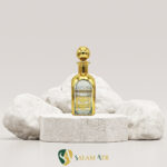 شیشه عطر RCR هرمی طلاکوب 250 میل کد AZY-16-25 طرح (4) برروی سنگ