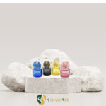 شیشه عطر داو 30 میل رنگی کد PT717C برروی سنگ